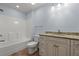 Bathroom featuring a bathtub and granite vanity at 425 Retriever Ct., Murrells Inlet, SC 29576