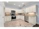 Kitchen featuring white cabinets, stainless appliances and granite countertops at 425 Retriever Ct., Murrells Inlet, SC 29576