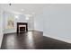 Living room features a fireplace, hardwood floors and natural light at 425 Retriever Ct., Murrells Inlet, SC 29576