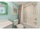 Bathroom featuring a shower/tub combo and framed print at 4301 S Ocean Blvd. # 7A, North Myrtle Beach, SC 29582