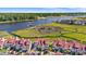 Aerial view of townhomes with red roofs by the waterway at 4396 Baldwin Ave. # 19, Little River, SC 29566