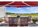 Relaxing balcony with seating that provides expansive views of the water and marsh at 4396 Baldwin Ave. # 19, Little River, SC 29566