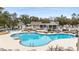 Resort-style pool area with comfortable lounge seating and adjacent clubhouse at 4413 Bed Straw Ct., Murrells Inlet, SC 29576