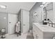 Bright bathroom featuring a double sink vanity, crisp white cabinets, and coastal-themed decor at 4502 Little River Inn Ln. # 2507, Little River, SC 29566