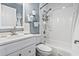 Bright bathroom featuring a tub with shower and vanity with sink at 4502 Little River Inn Ln. # 2507, Little River, SC 29566