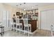 Inviting kitchen with modern appliances, breakfast bar with seating, and stylish decor, creating a warm and functional space at 4502 Little River Inn Ln. # 2507, Little River, SC 29566