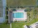 Overhead view of a community swimming pool, lined with lounge chairs and umbrellas at 4502 Little River Inn Ln. # 2507, Little River, SC 29566