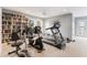 Well-equipped workout room with exercise machines, natural light, and a cozy reading nook at 4515 Lighthouse Dr. # 25B, Little River, SC 29566