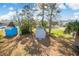 An expansive backyard featuring multiple storage buildings and trees creating a tranquil outdoor space at 4601 Lewis St., North Myrtle Beach, SC 29582