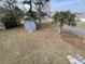 Backyard featuring a shed and a palm tree at 4601 Lewis St., North Myrtle Beach, SC 29582