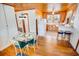 Bright kitchen featuring light wood cabinets and a dining area with seating at 4601 Lewis St., North Myrtle Beach, SC 29582