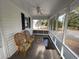 Relaxing screened-in porch with seating and ceiling fan at 4601 Lewis St., North Myrtle Beach, SC 29582