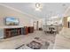 Cozy living room area with fireplace and carpeted floors at 4872 Dahlia Ct. # 202, Myrtle Beach, SC 29577