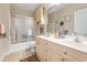 Well-lit bathroom with a dual sink vanity, tiled floor, and shower-tub combination at 4882 Luster Leaf Circle # 305, Myrtle Beach, SC 29577