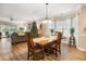 Dining area seamlessly flows into the living room, perfect for entertaining at 4882 Luster Leaf Circle # 305, Myrtle Beach, SC 29577