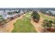 Aerial view of the golf course showcasing meticulously maintained greens near condos at 4882 Luster Leaf Circle # 305, Myrtle Beach, SC 29577