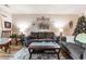 Comfortable living room featuring stylish furniture, wood floors and a decorative wall art at 4882 Luster Leaf Circle # 305, Myrtle Beach, SC 29577