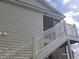 Exterior view of stairs leading to the upper level porch at 4905 Britewater Ct. # 202, Myrtle Beach, SC 29579