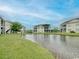 Scenic view of the pond surrounded by beautiful multi-story residential buildings at 4905 Britewater Ct. # 202, Myrtle Beach, SC 29579