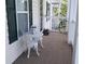 Covered porch with comfortable metal seating at 4905 Britewater Ct. # 202, Myrtle Beach, SC 29579