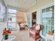 Relaxing screened porch with comfortable seating at 4905 Britewater Ct. # 202, Myrtle Beach, SC 29579