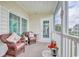 Cozy porch with wicker furniture and a view at 4905 Britewater Ct. # 202, Myrtle Beach, SC 29579