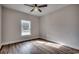 Empty bedroom featuring wood-look floors, neutral paint and a ceiling fan at 4975 Dupont Rd., Conway, SC 29526