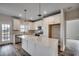 Modern kitchen featuring white cabinets, stainless steel appliances and a large island at 4975 Dupont Rd., Conway, SC 29526