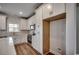 Modern kitchen with white cabinets, stainless steel appliances and a eat in breakfast bar at 4975 Dupont Rd., Conway, SC 29526