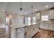 Eat in kitchen island with quartz countertops and hardwood floors at 4975 Dupont Rd., Conway, SC 29526