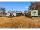 A view of the backyard with multiple outbuildings at 5002 Watergate Dr., Myrtle Beach, SC 29588