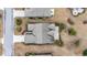 Aerial view of a home and surrounding landscape showcases mature trees, driveway, and roofline at 5230 Piemonte Ln., Myrtle Beach, SC 29579