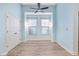 Bright dining area features a modern ceiling fan, hardwood floors, and natural light at 5230 Piemonte Ln., Myrtle Beach, SC 29579