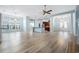 Spacious living room featuring hardwood floors, elegant lighting, and an open floor plan at 5230 Piemonte Ln., Myrtle Beach, SC 29579
