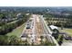 Aerial view of new construction homes situated alongside a wooded area and a small lake at 530 Haven View Way, Murrells Inlet, SC 29576