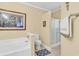 Bright bathroom features a soaking tub with shower and a separate shower stall at 537 Sand Ridge Rd., Conway, SC 29526