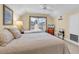 Bedroom featuring two twin beds, large window, ceiling fan and light-colored walls at 537 Sand Ridge Rd., Conway, SC 29526