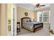 Bedroom features a bed with blue comforter, closet access and natural light at 537 Sand Ridge Rd., Conway, SC 29526