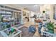 A living room dining room area with tiled floors, bright colors, and a view into the kitchen at 537 Sand Ridge Rd., Conway, SC 29526