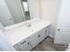 Modern bathroom with a vanity featuring a white countertop and gray cabinets at 546 Haven View Way, Murrells Inlet, SC 29576