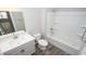 Bathroom features white vanity with sink and a shower-tub combo at 546 Haven View Way, Murrells Inlet, SC 29576