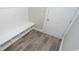 Mudroom with built-in bench and storage cubbies, with gray wood-look tile flooring at 546 Haven View Way, Murrells Inlet, SC 29576