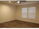 Bright bedroom with a ceiling fan and natural light from the large window at 5810 Hwy 9, Nichols, SC 29581