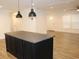 An eat-in kitchen featuring a large island with pendant lighting and light wood floors at 5810 Hwy 9, Nichols, SC 29581