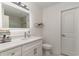 Bright bathroom featuring marble floors, a white vanity, and modern fixtures for a clean, stylish space at 5811 Sumter Dr., Myrtle Beach, SC 29577