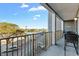 Balcony with seating overlooks the parking lot and ocean at 5905 S Kings Hwy. # 327 A, Myrtle Beach, SC 29575