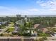 Scenic aerial view showcasing a neighborhood with a community pool and distant ocean views at 705 11Th Ave. S, North Myrtle Beach, SC 29582