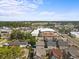 Aerial view of residential area with mixed retail and commercial buildings in background at 705 11Th Ave. S, North Myrtle Beach, SC 29582