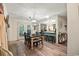 Cozy dining area featuring a wooden table, and a seamless connection to the kitchen at 705 11Th Ave. S, North Myrtle Beach, SC 29582