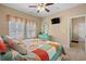 Bedroom featuring ocean themed decor, a television, and natural light from the window at 709 Shell Creek Circle # 709, North Myrtle Beach, SC 29582